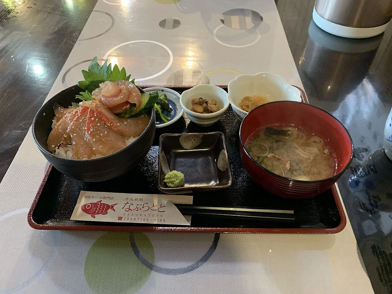 Seafood rice bowl with sashimi, soup and small side dishes in Higashiizu